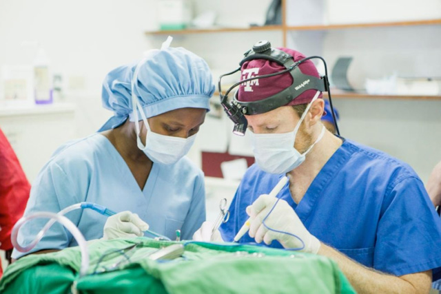 doctors operating on patient